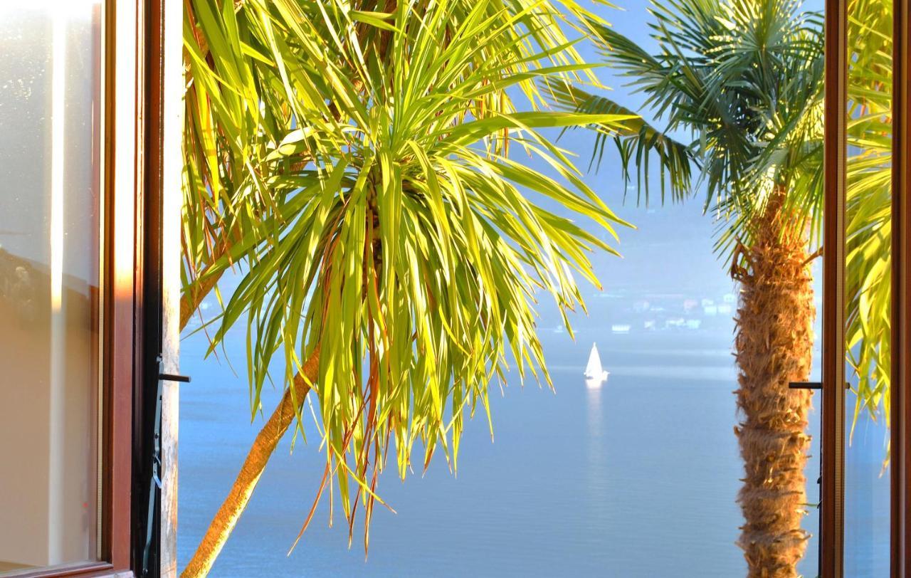 Apartment The Palm With Garden Sala Comacina Exterior foto